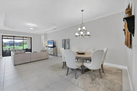 a bedroom with two beds and a night stand