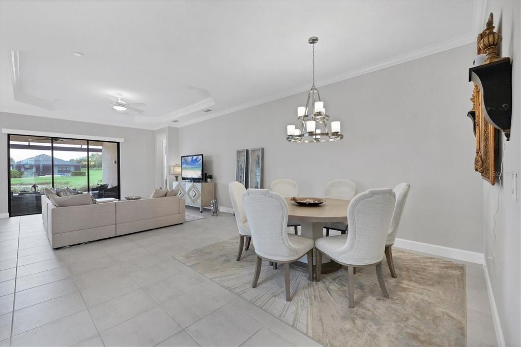4735 Cassio Court Bradenton, FL 34211 - Photo 15 of 100 a view of a dining room with furniture window and outside view