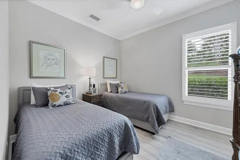 a workspace with furniture and a potted plant