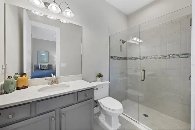 a view of yard with swimming pool and green space