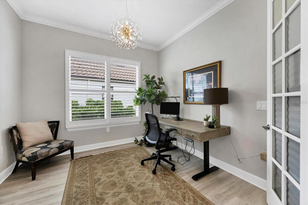 4735 Cassio Court Bradenton, FL 34211 - Photo 30 of 100 a view of a workspace with furniture and a window