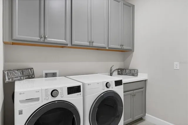 a view of a house with a small yard and plants