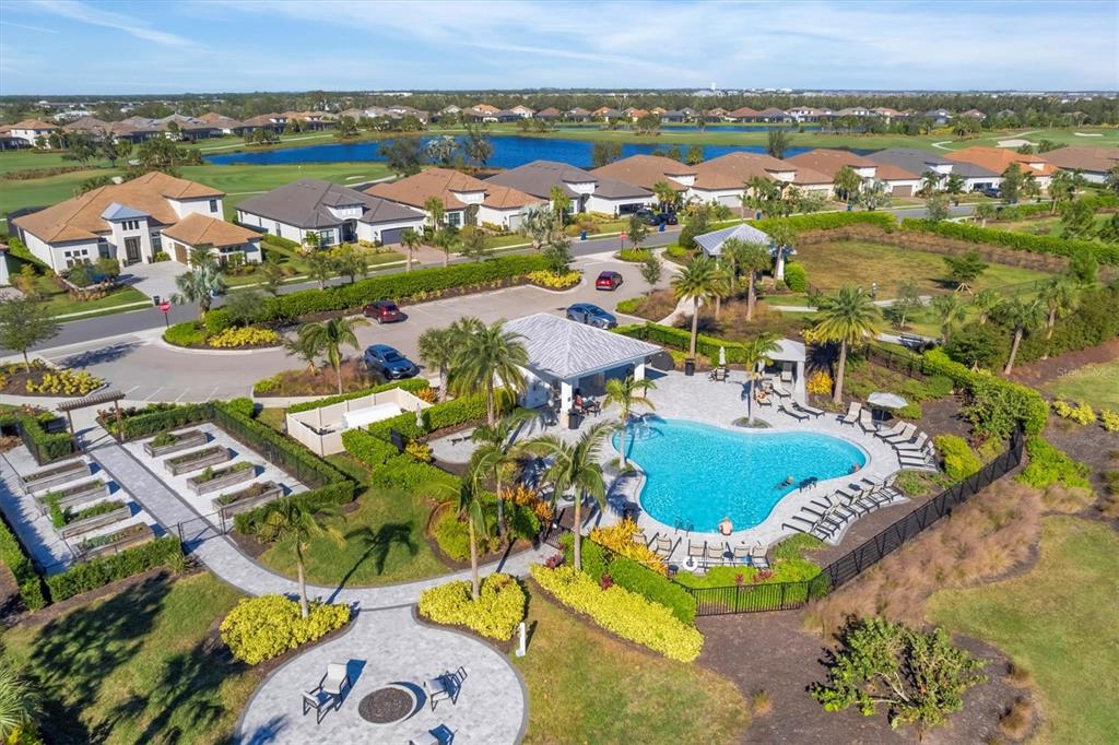 4735 Cassio Court Bradenton, FL 34211 - Photo 72 of 100 an aerial view of residential houses with outdoor space