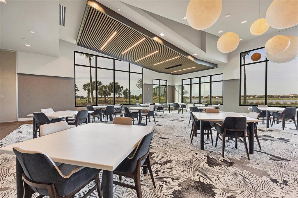 4735 Cassio Court Bradenton, FL 34211 - Photo 100 of 100 a view of a dining room with furniture
