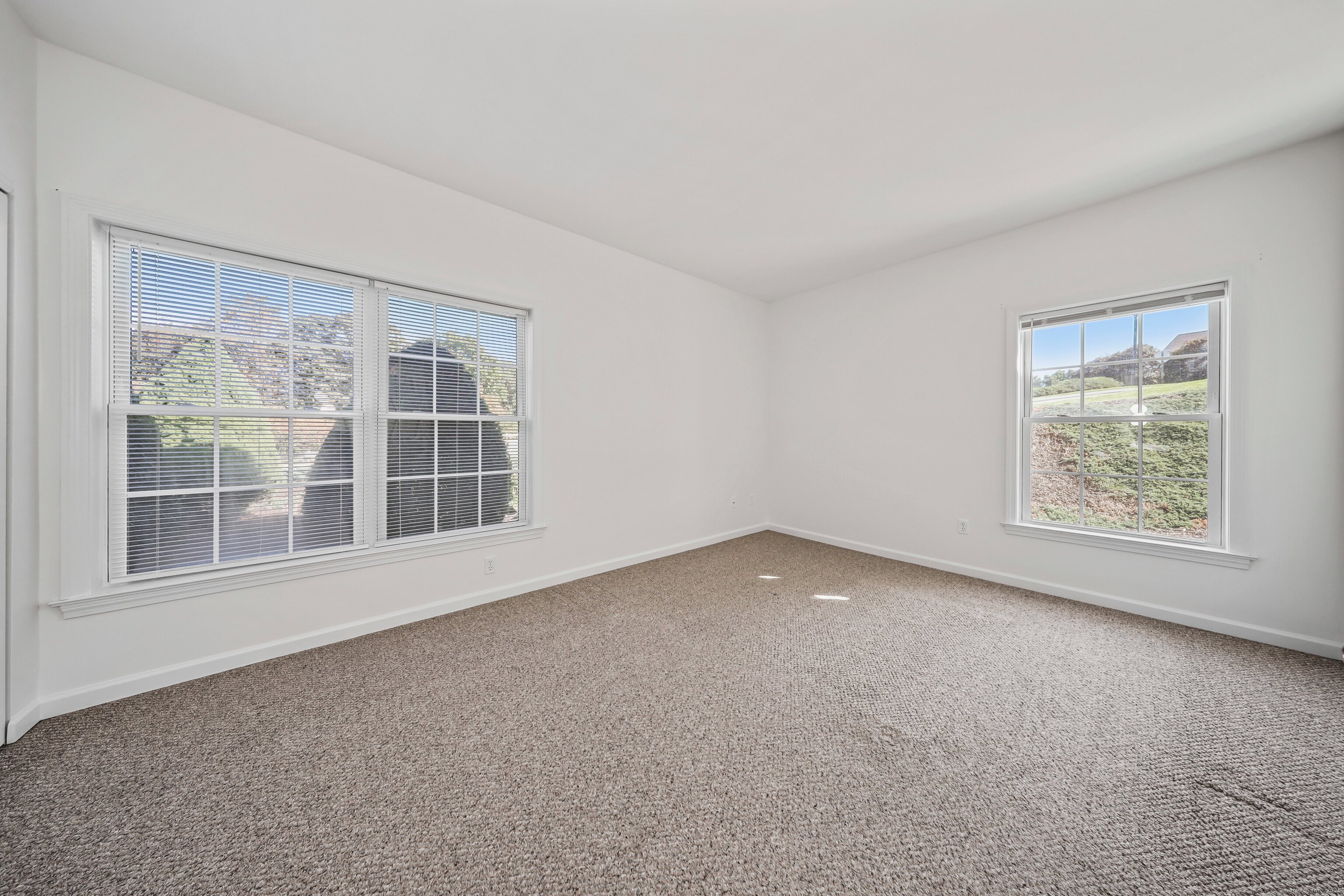 211 Pine Hill Boulevard, Unit 211 Plymouth, CT 06782 - Photo 13 of 35 an empty room with a window