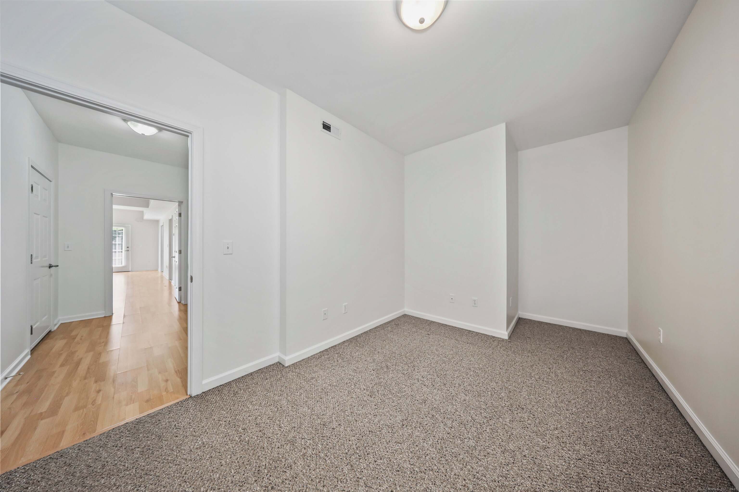 211 Pine Hill Boulevard, Unit 211 Plymouth, CT 06782 - Photo 20 of 35 a view of an empty room