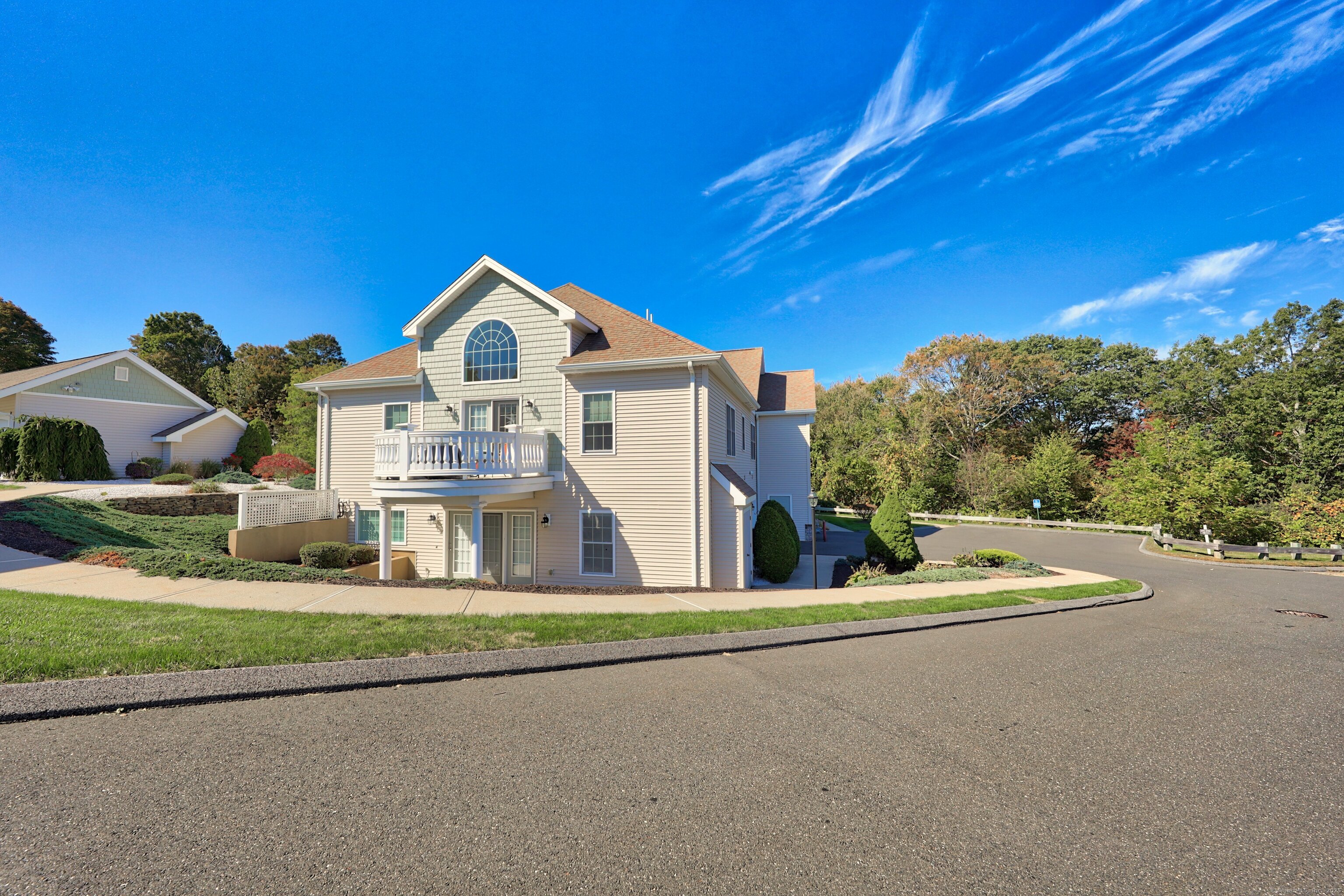 211 Pine Hill Boulevard, Unit 211 Plymouth, CT 06782 - Photo 28 of 35 a front view of a house with a yard