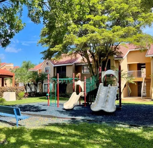 a front view of a house with swimming pool