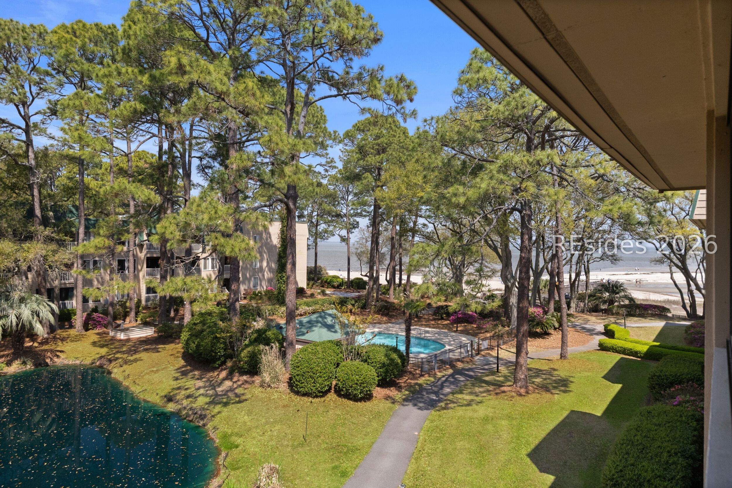 239 Beach City Road, Unit 1317 Hilton Head Island, SC 29926 - Photo 15 of 23 Direct pool to sound views from the screened porch