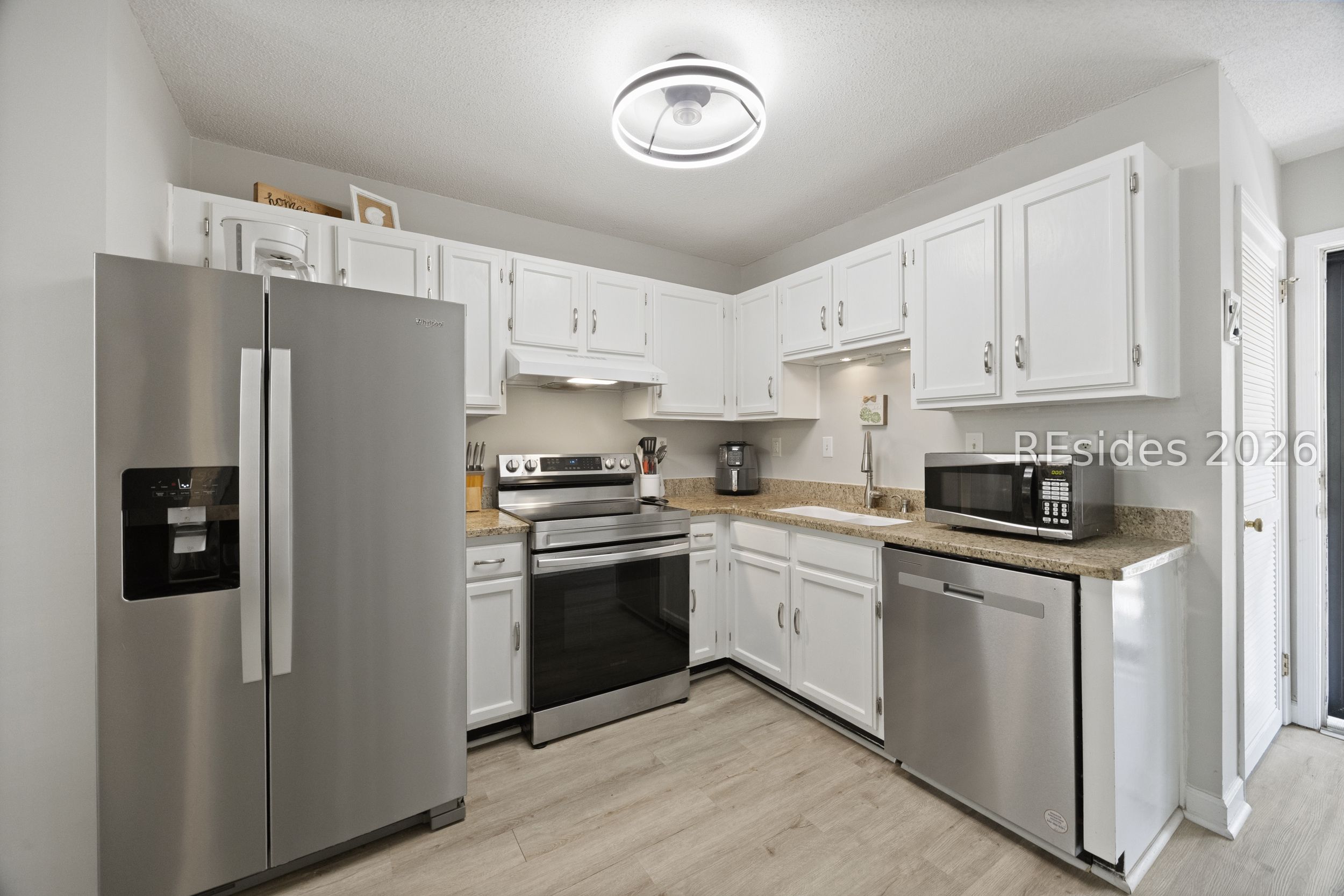 239 Beach City Road, Unit 1317 Hilton Head Island, SC 29926 - Photo 4 of 23 Updated appliances in the kitchen.