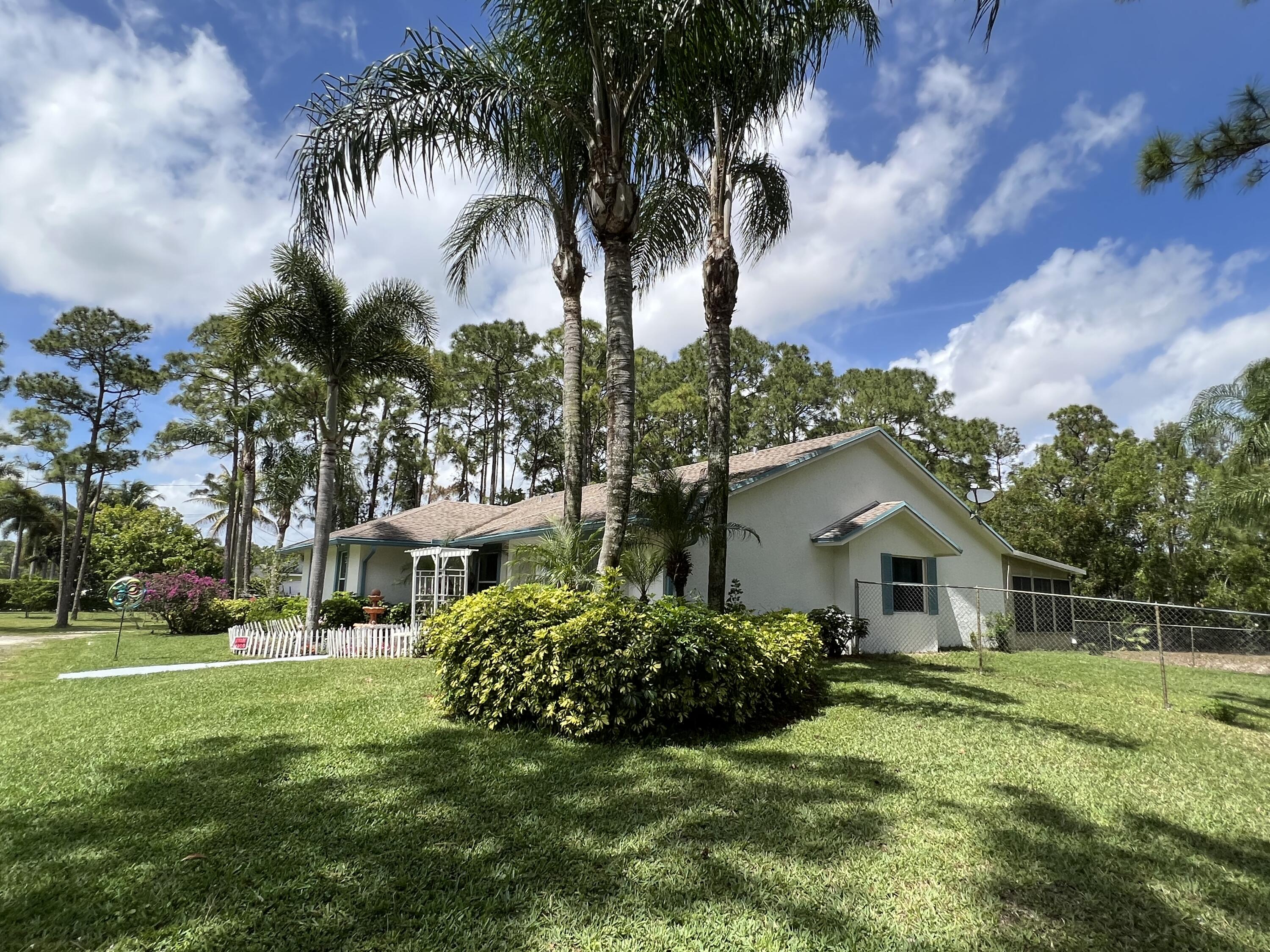 12439 86th Road North The Acreage, FL 33412 - Photo 5 of 54 EE0A543C-06E8-4A89-8C65-041603B3E4C4