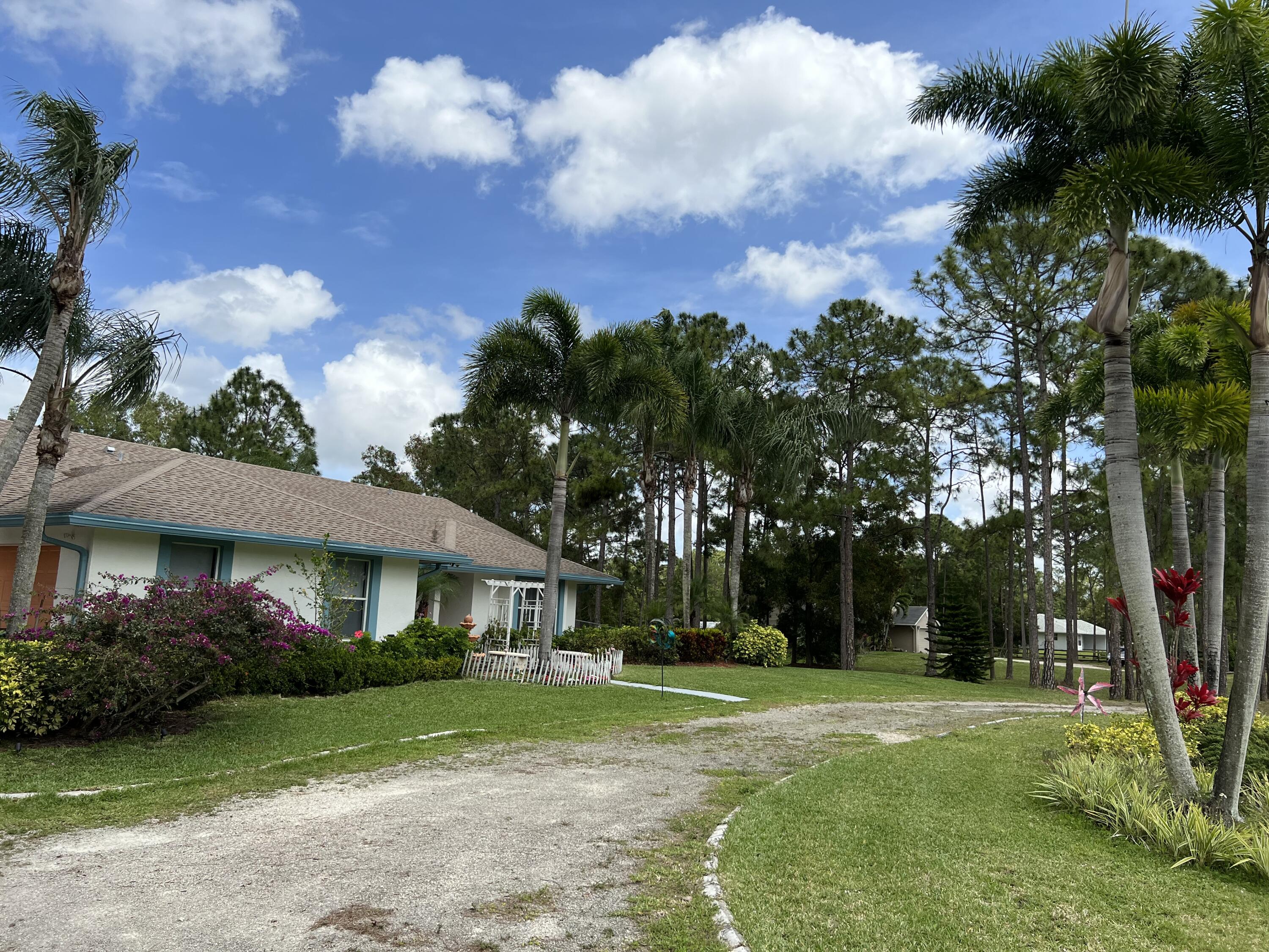 12439 86th Road North The Acreage, FL 33412 - Photo 6 of 54 0702B26A-D483-4FC8-AD99-2C10C6B3D563