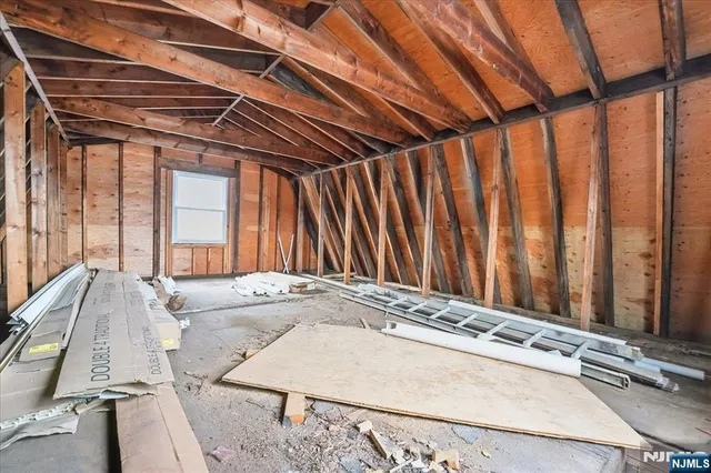 a bathroom with a tub and shower