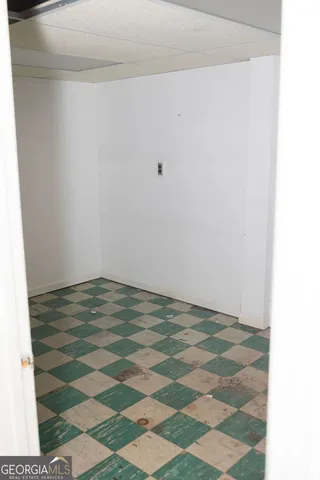 a view of a street with an umbrella