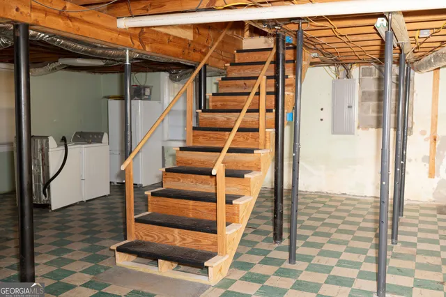 a view of a car with porch in front of house