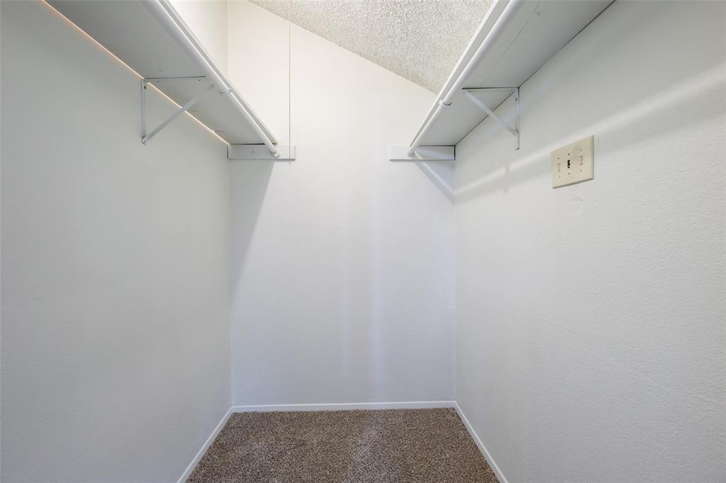 3506 Speedway, Unit 302 Austin, TX 78705 - Photo 22 of 27 Walk in closet with dark colored carpet
