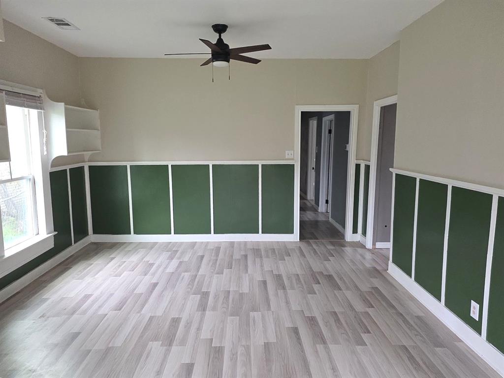 612 North Adelaide Street Terrell, TX 75160 - Photo 3 of 11 Living room with a ceiling fan and light wood-style flooring