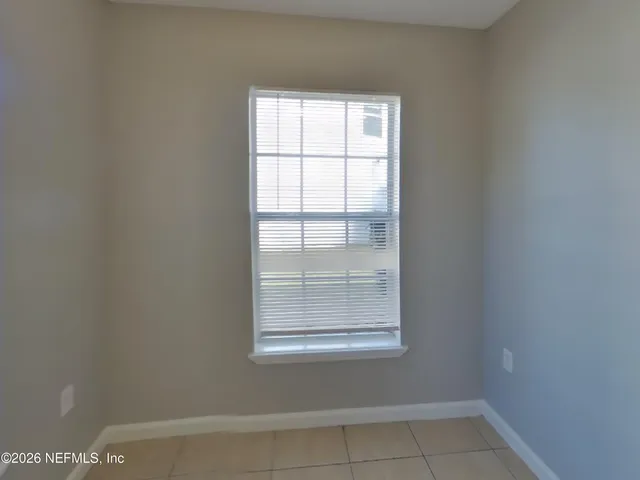 an empty room with a window