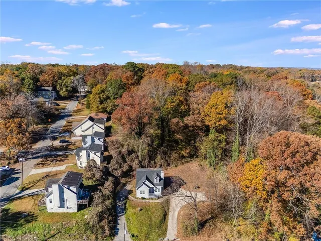 an aerial view of residential house with outdoor space