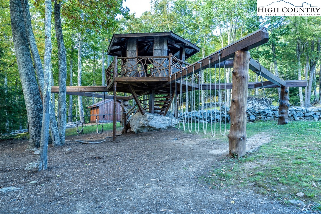 5 Eagles Nest Trail Banner Elk, NC 28604 - Photo 18 of 36 a front view of a house with garden