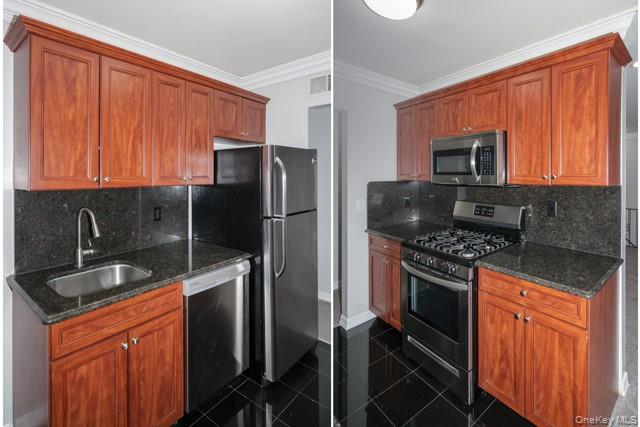 111 College Road, Unit 2F Selden, NY 11784 - Photo 3 of 11 a kitchen with stainless steel appliances granite countertop a stove a refrigerator and a sink