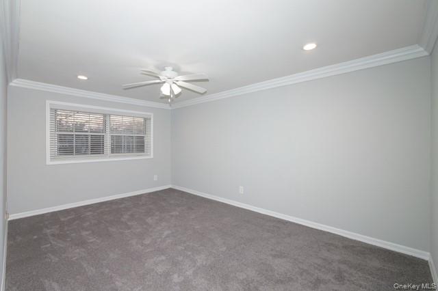 111 College Road, Unit 2F Selden, NY 11784 - Photo 7 of 11 an empty room with windows and fan