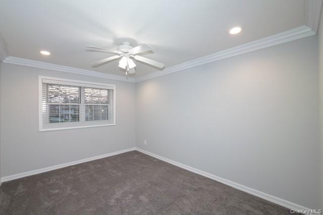 111 College Road, Unit 2F Selden, NY 11784 - Photo 9 of 11 an empty room with a window and a fan