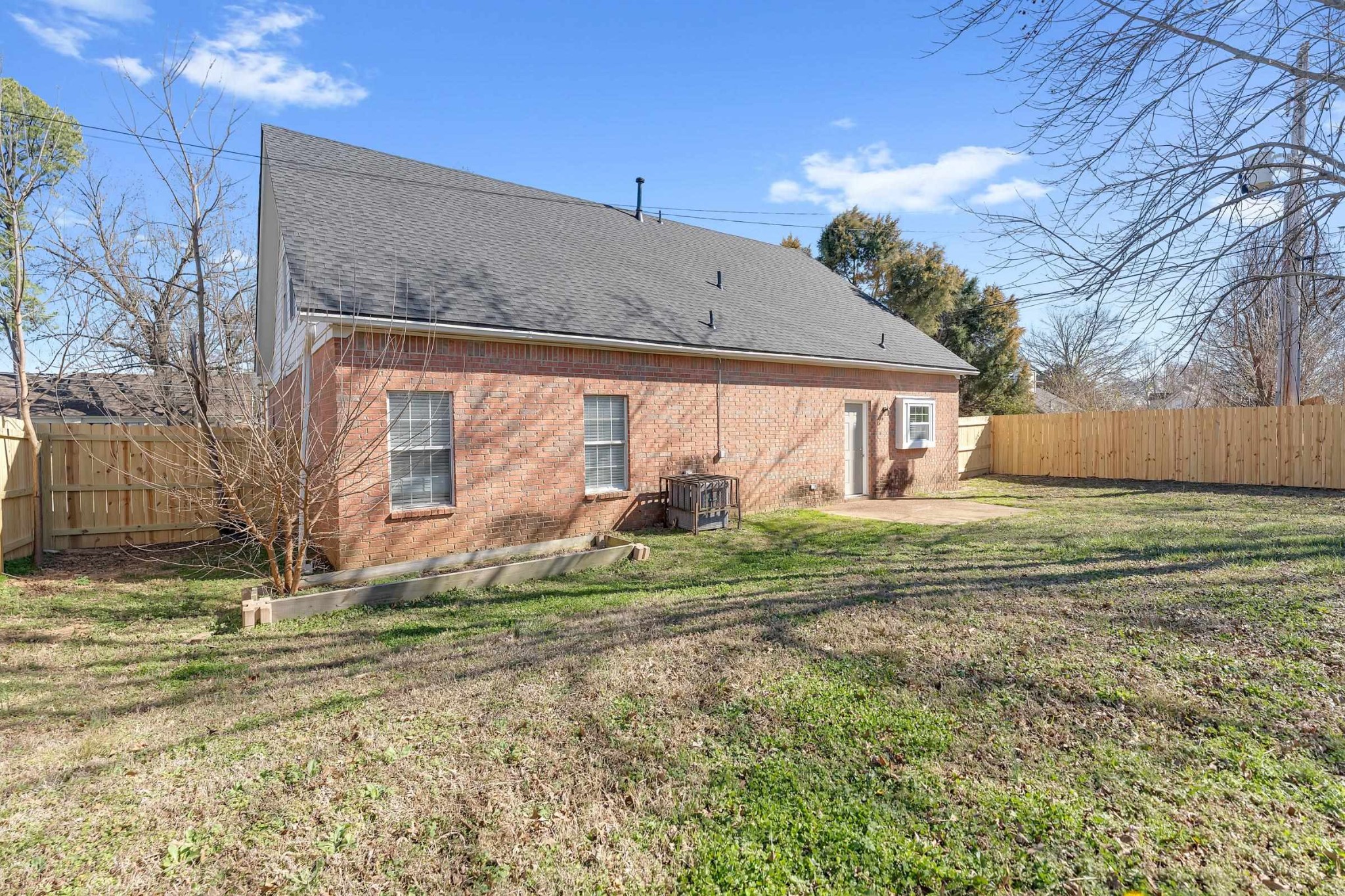 2593 Kate Bond Road Memphis, TN 38133 - Photo 25 of 33 a front view of house with garden