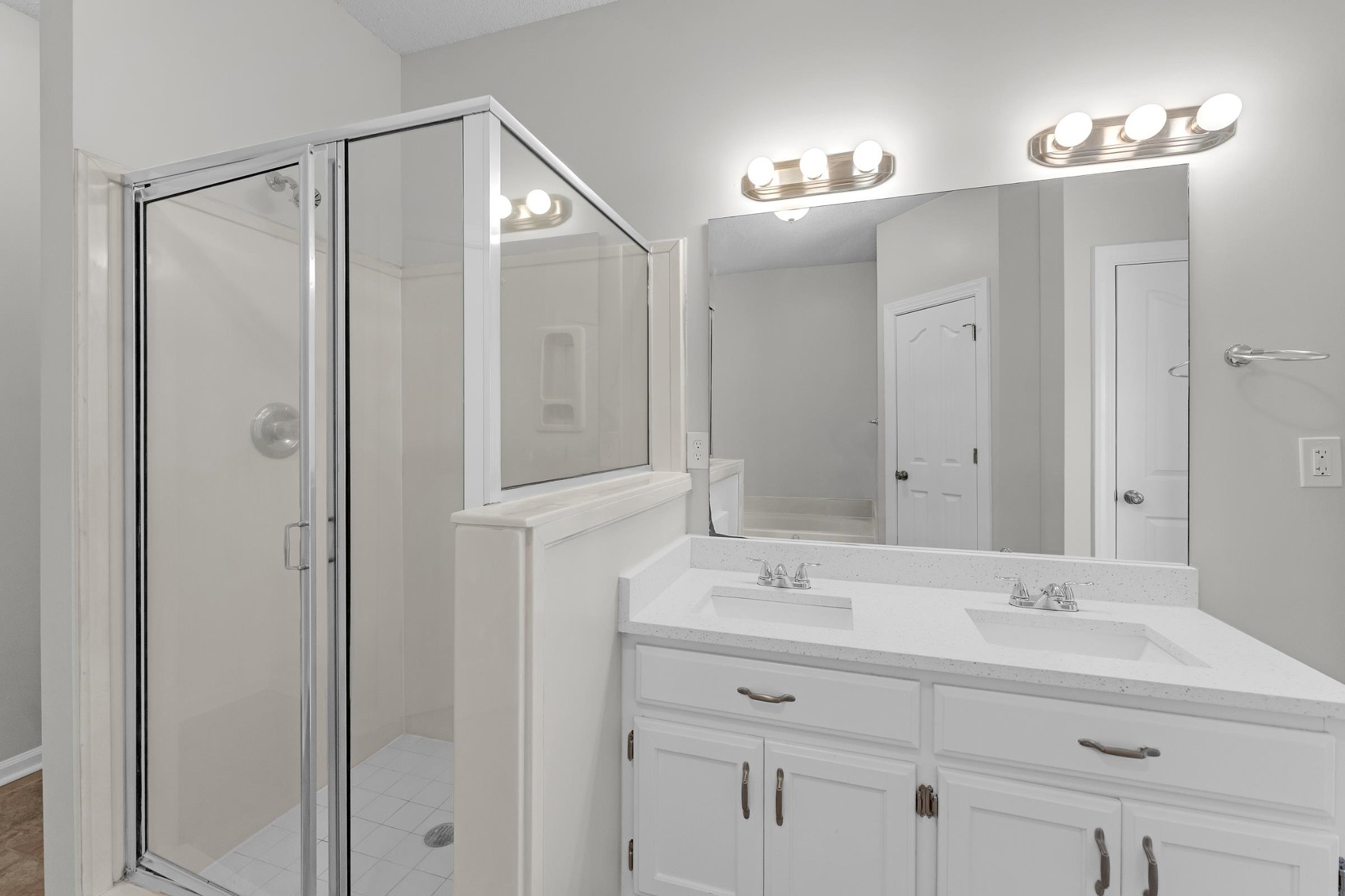 2593 Kate Bond Road Memphis, TN 38133 - Photo 8 of 33 a bathroom with a sink shower and a mirror