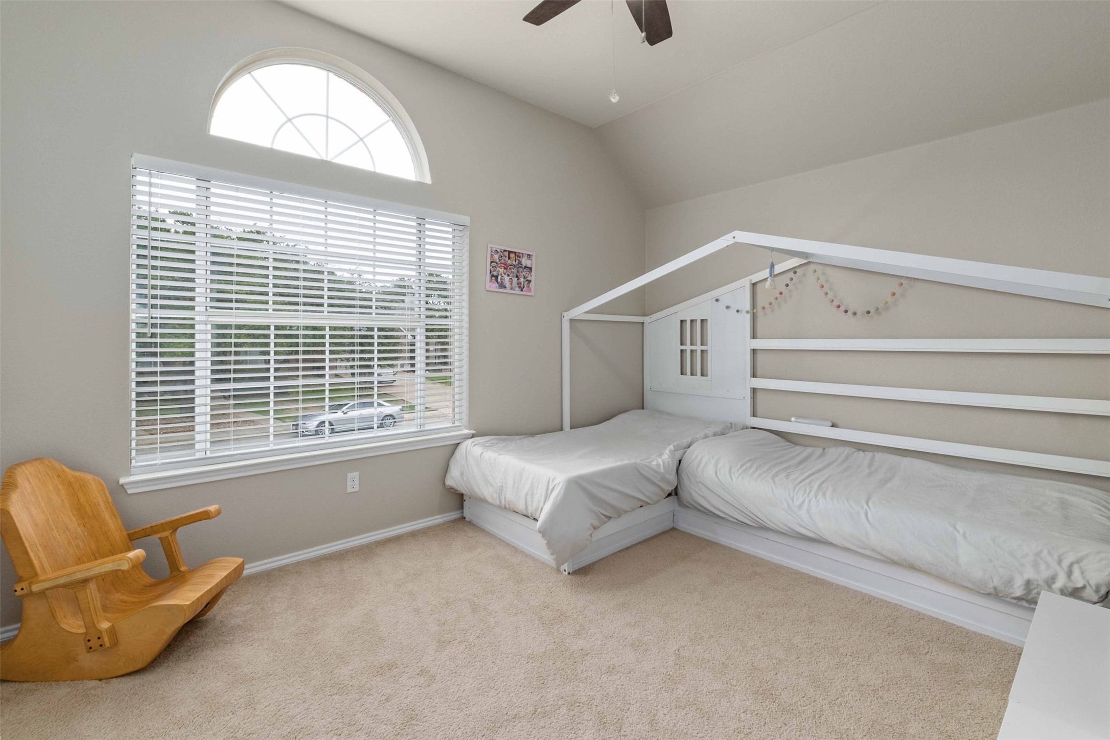 3704 Runnels Court Austin, TX 78732 - Photo 21 of 30 Carpeted bedroom a ceiling fan, and vaulted ceiling