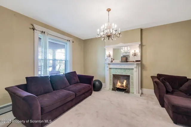 a kitchen with a stove a sink and a refrigerator