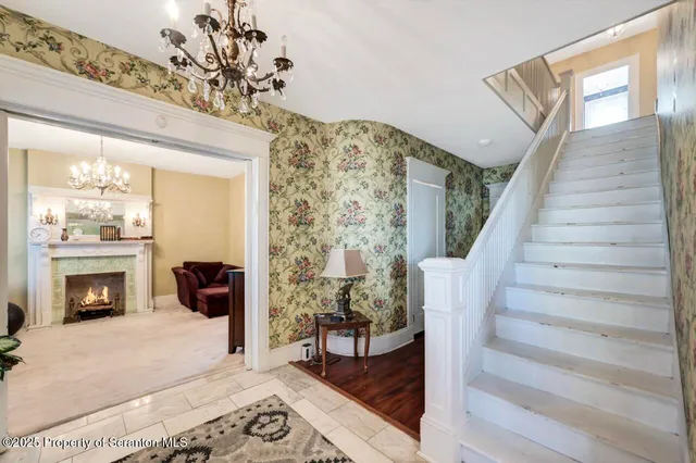 a view of a bedroom with washer and dryer