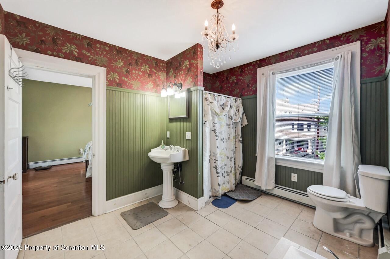 616-618 Harrison Avenue Scranton, PA 18510 - Photo 42 of 73 a bathroom with a sink toilet and shower