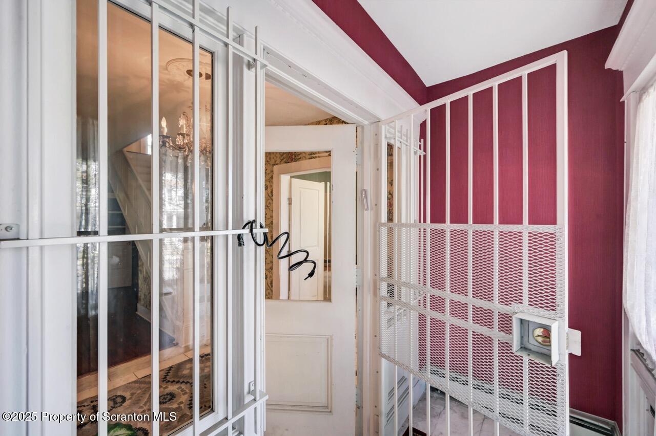 616-618 Harrison Avenue Scranton, PA 18510 - Photo 68 of 73 a view of a hallway with wooden floor and entryway