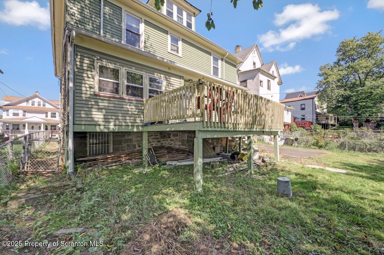 616-618 Harrison Avenue Scranton, PA 18510 - Photo 71 of 73 a backyard of a house with table and chairs