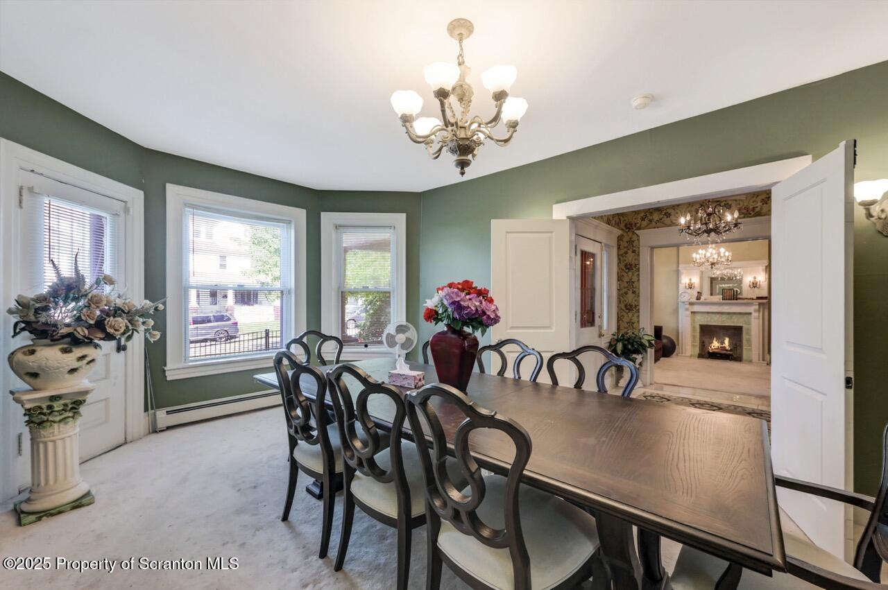 616-618 Harrison Avenue Scranton, PA 18510 - Photo 9 of 73 a view of a dining room with furniture window and outside view