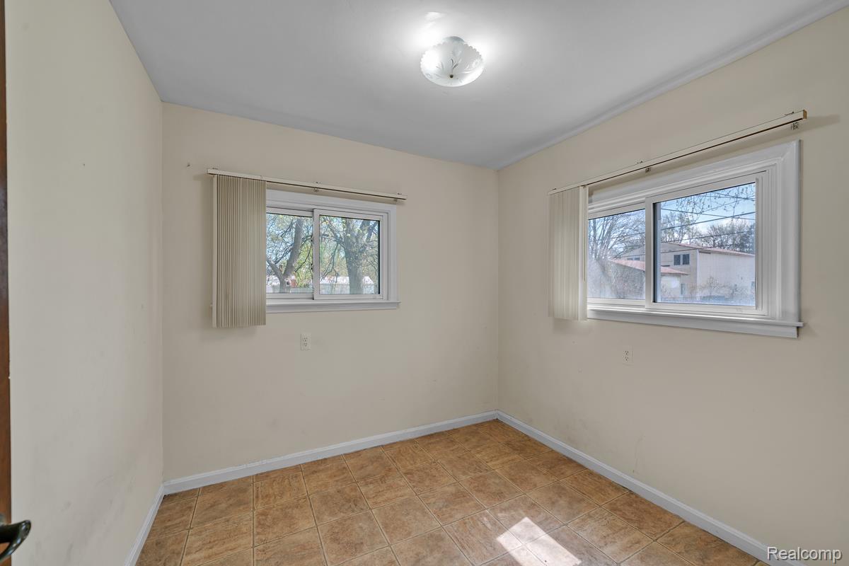 8620 Stephens Road Warren, MI 48089 - Photo 15 of 15 Spare room featuring healthy amount of natural light