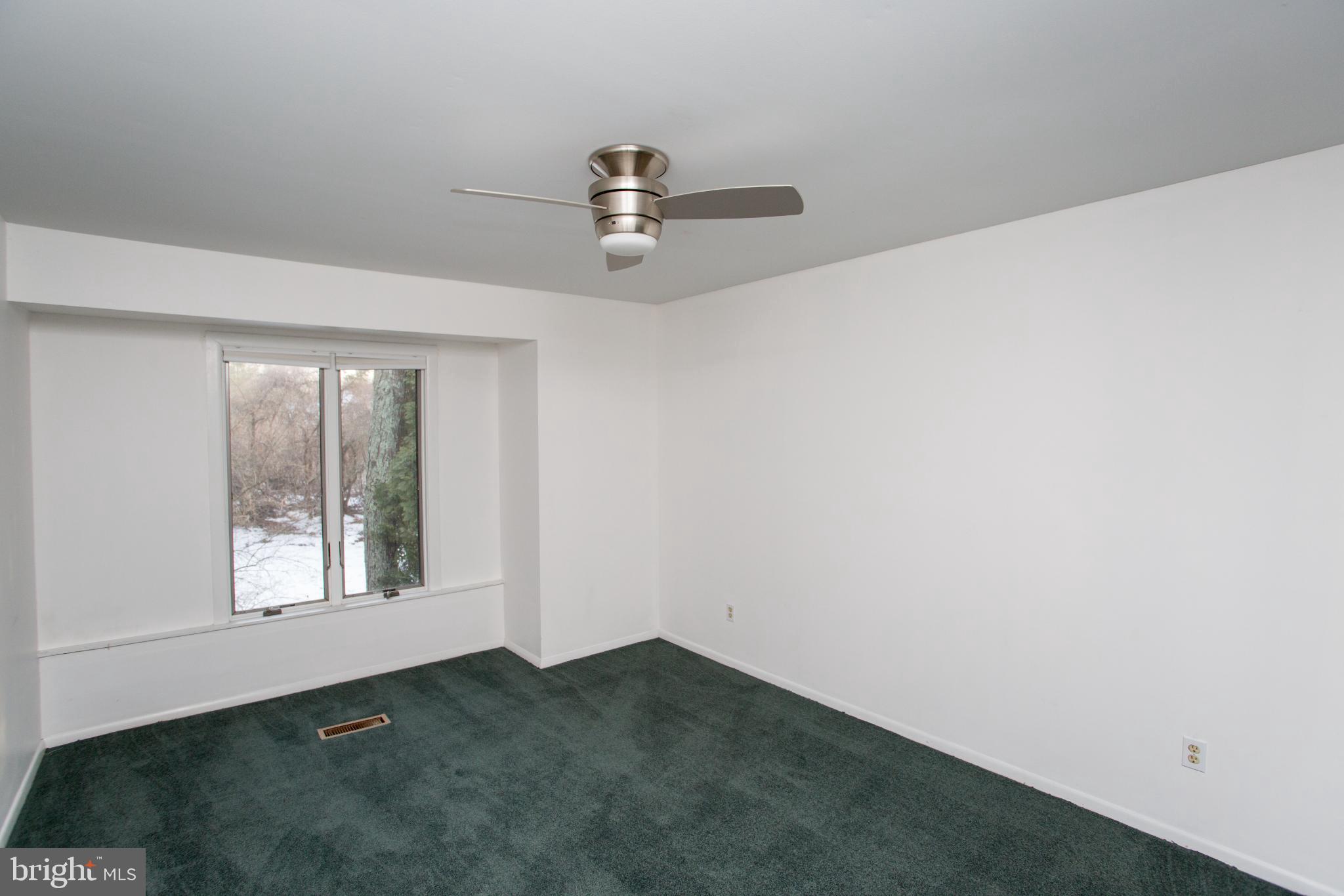 17 Eden Roc New Hope, PA 18938 - Photo 19 of 27 an empty room with a window