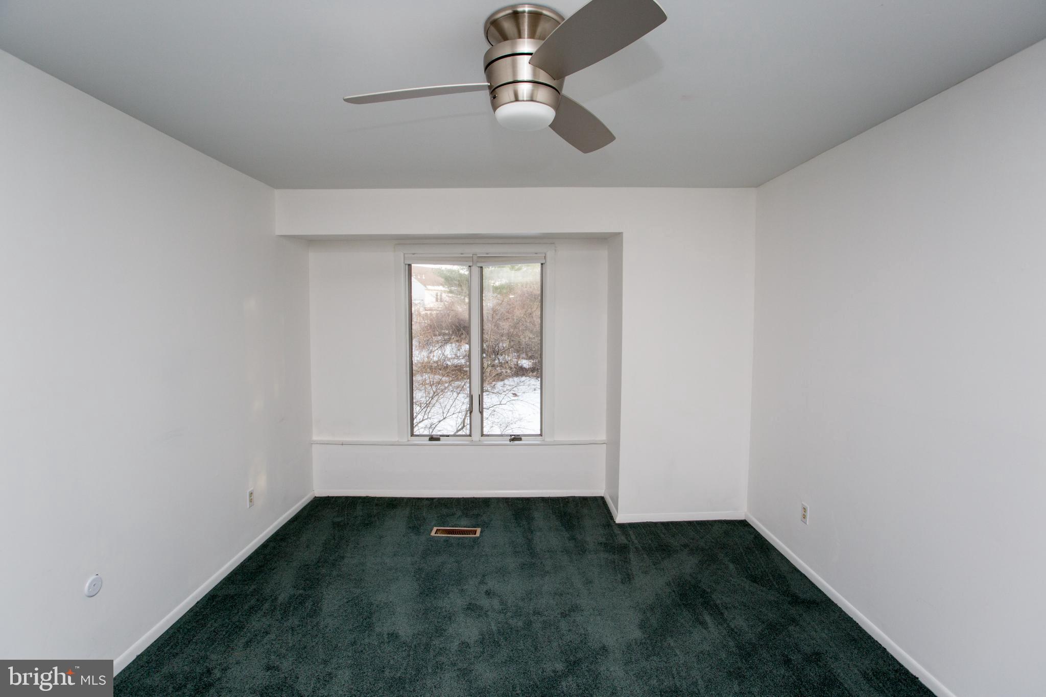 17 Eden Roc New Hope, PA 18938 - Photo 20 of 27 a view of an empty room and window
