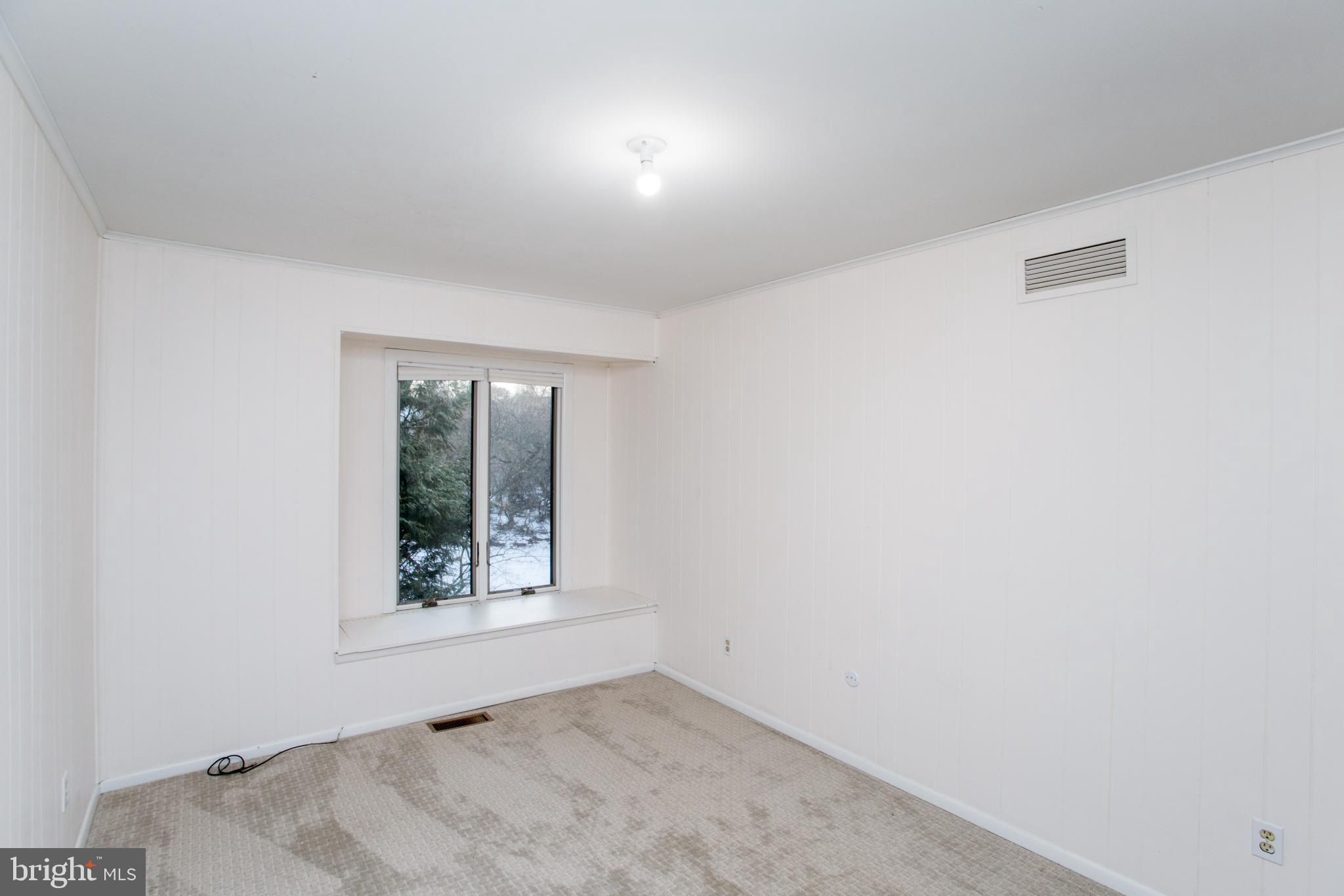 17 Eden Roc New Hope, PA 18938 - Photo 23 of 27 an empty room with a window