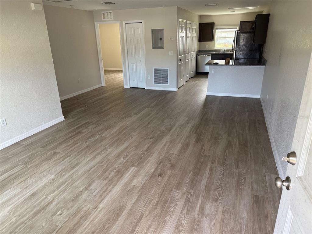 316 Pleasant Grove Road, Unit 2 Inverness, FL 34452 - Photo 11 of 12 a view of a kitchen from a hallway