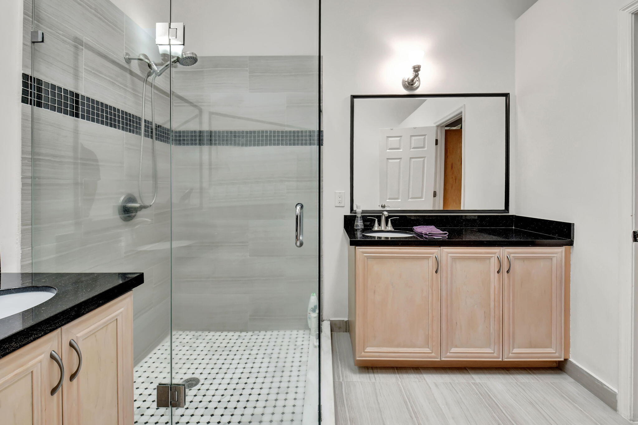 2469 Northwest 66th Drive Boca Raton, FL 33496 - Photo 23 of 45 a bathroom with a shower and a sink