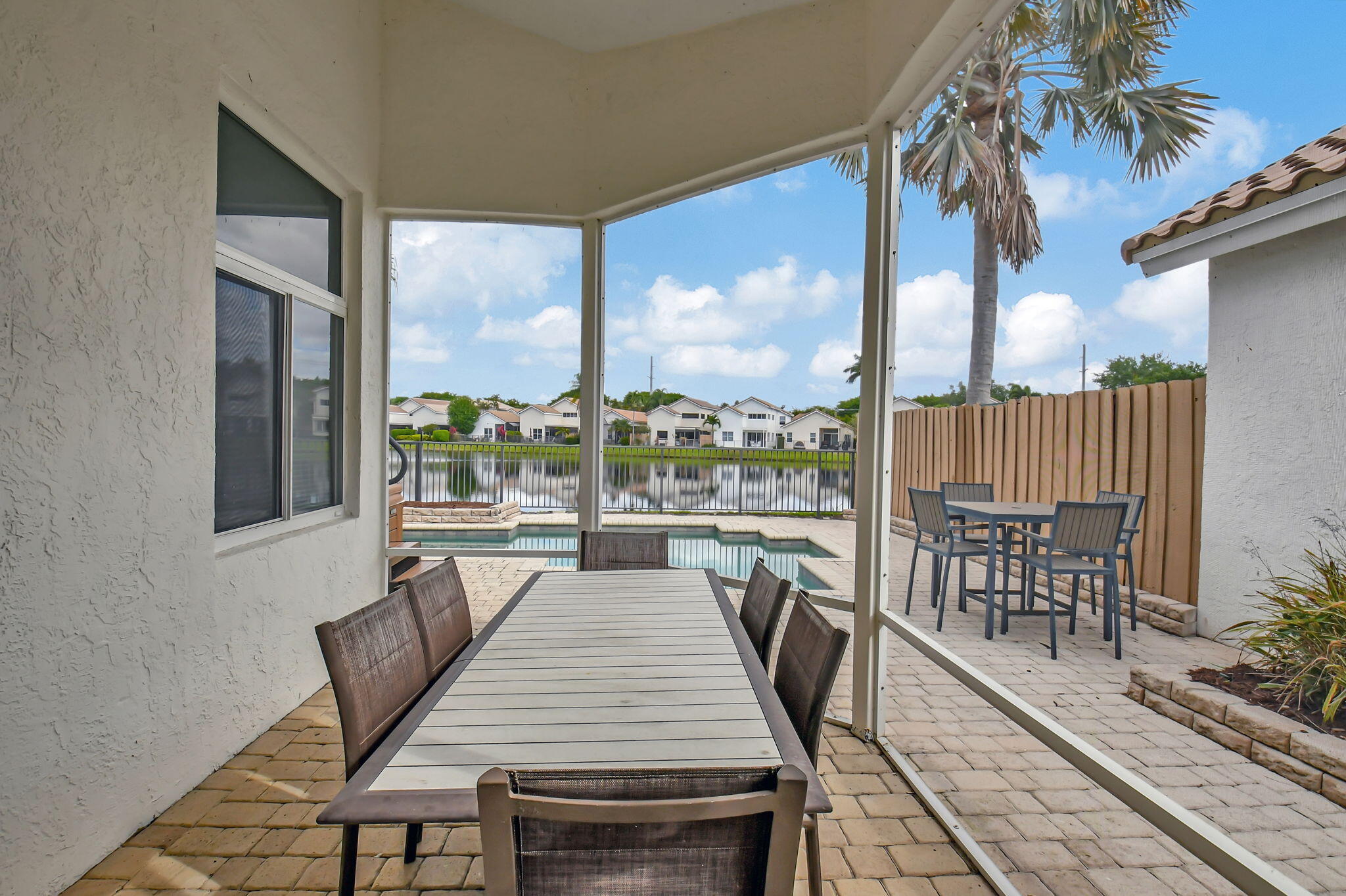 2469 Northwest 66th Drive Boca Raton, FL 33496 - Photo 26 of 45 a outdoor space with furniture