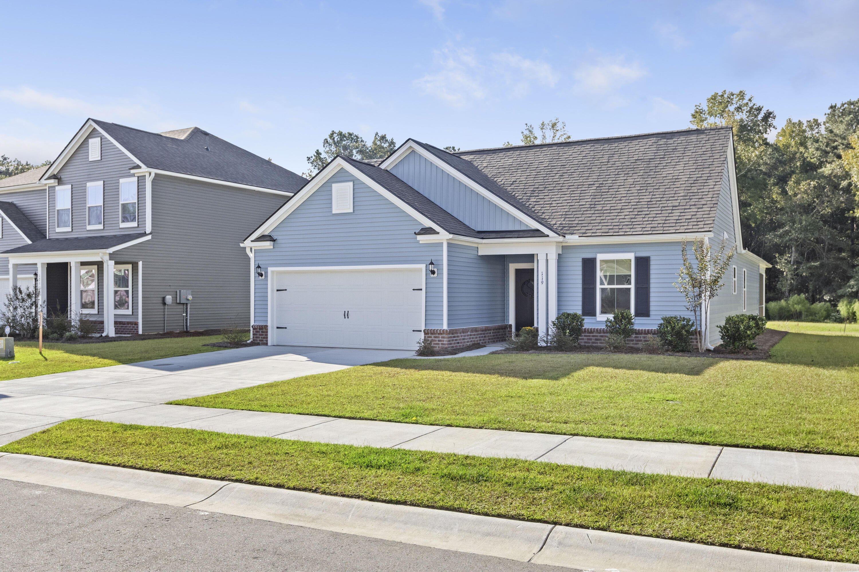 119 Royal Cainhoy Way Huger, SC 29450 - Photo 1 of 49 119RoyalCainhoyWy-CasaVerdeMediaLLC46