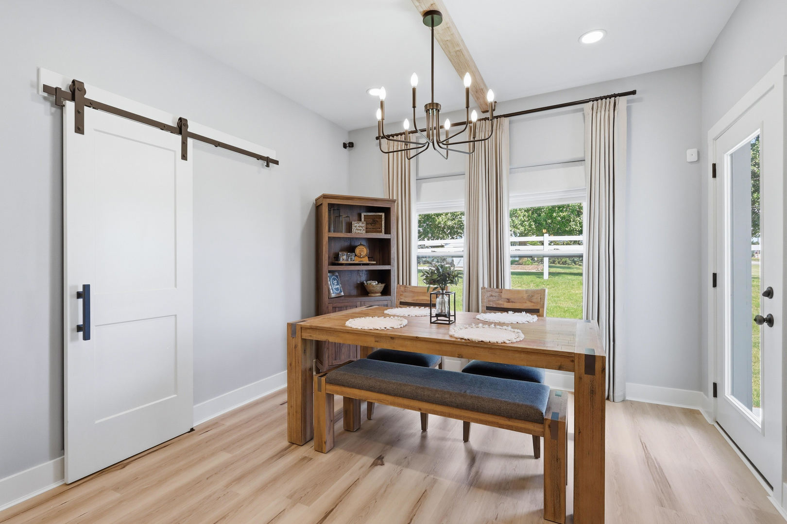 6779 Genesis Way Bettendorf, IA 52722 - Photo 16 of 36 a view of a dining room with a table and chairs