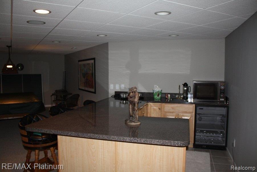 3027 Heather Road Ann Arbor, MI 48108 - Photo 12 of 22 basement bar.jpg