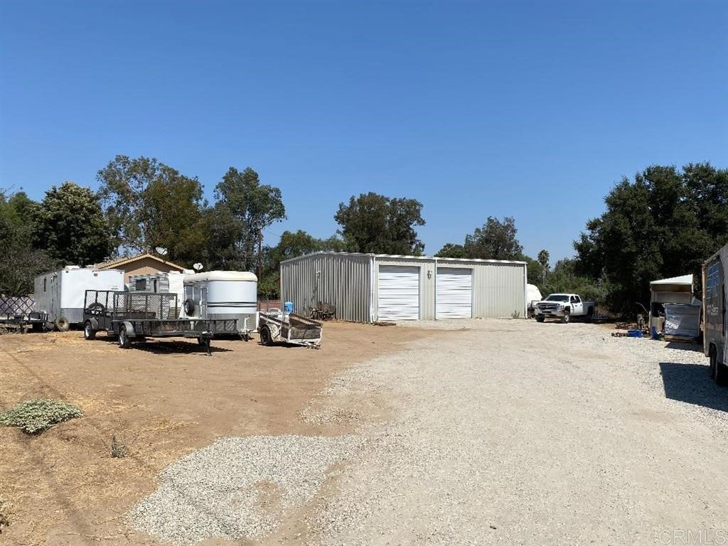 33961 Zeiders Road Menifee, CA 92584 - Photo 1 of 1 a view of a car park in front of house
