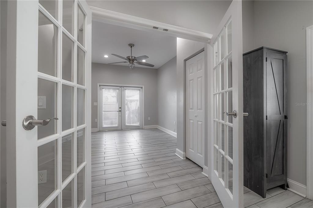 2341 West Chestnut Street Tampa, FL 33607 - Photo 29 of 42 a view of a hallway with wooden floor and staircase