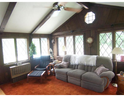 16 Governor Fuller Road Billerica, MA 01821 - Photo 11 of 21 a living room with furniture and a large window
