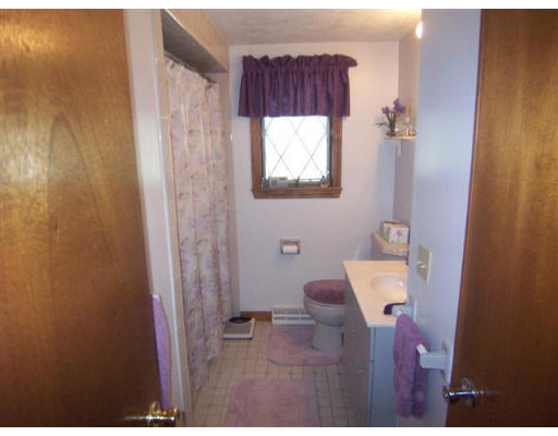 16 Governor Fuller Road Billerica, MA 01821 - Photo 13 of 21 a bathroom with a sink and a mirror